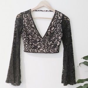 Black lace bell-sleeve crop top